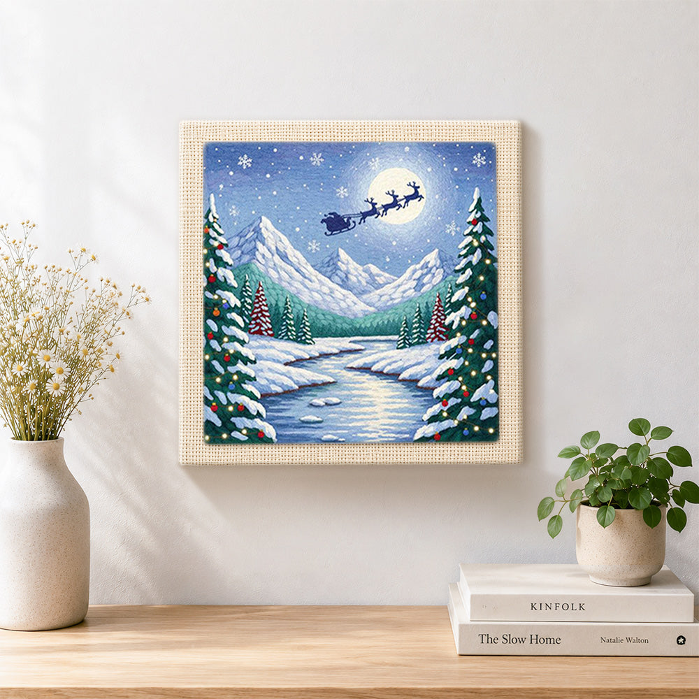 Finished santa’s sleigh over snow peaks artwork displayed on a wall