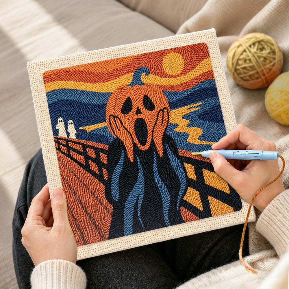 Creating handmade screaming pumpkin art punch needle artwork
