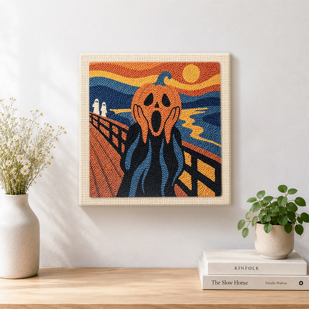 Finished screaming pumpkin art artwork displayed on a wall