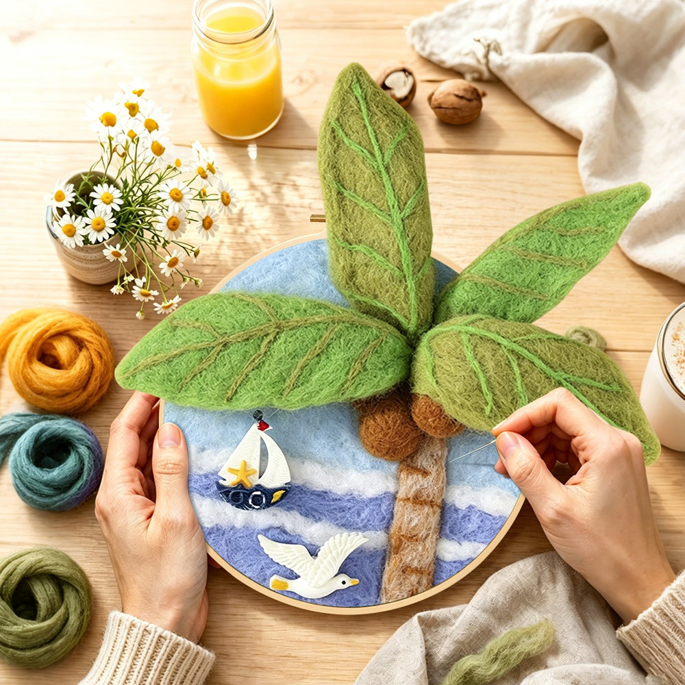 Creating the seagull, palm tree and sailboat wool painting by hand with a felting needle