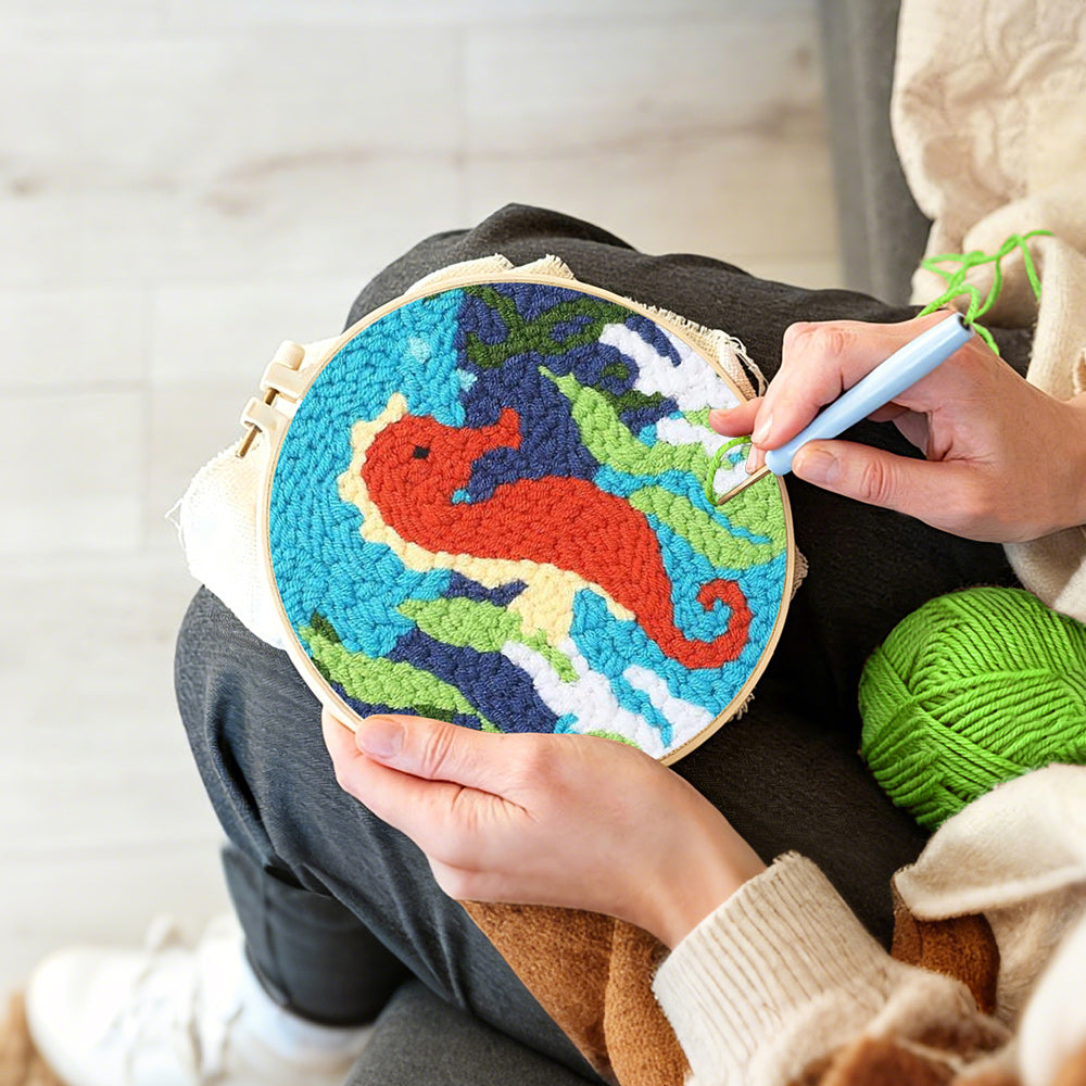 Creating handmade seahorse and seaweed punch needle artwork