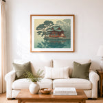 Finished serene lakeside shrine cross stitch artwork displayed as home decor