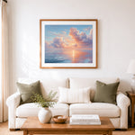 Finished serene sunset ocean cross stitch artwork displayed as home decor
