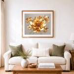 Finished shimmering golden floral cross stitch artwork displayed as home decor