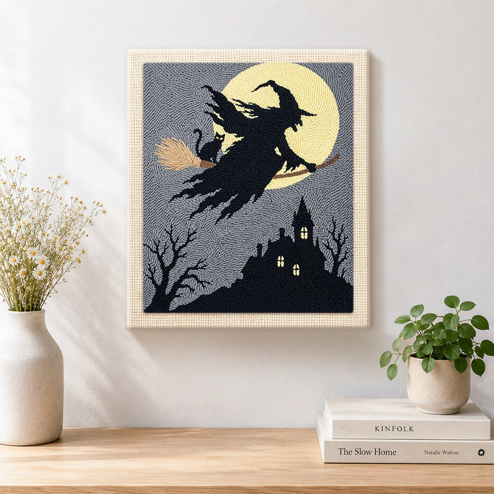 Finished silhouette witch flying artwork displayed on a wall