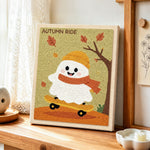 Skateboarding autumn ghost punch needle artwork displayed on a table