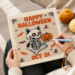 Creating handmade skeleton cat and pumpkin punch needle artwork