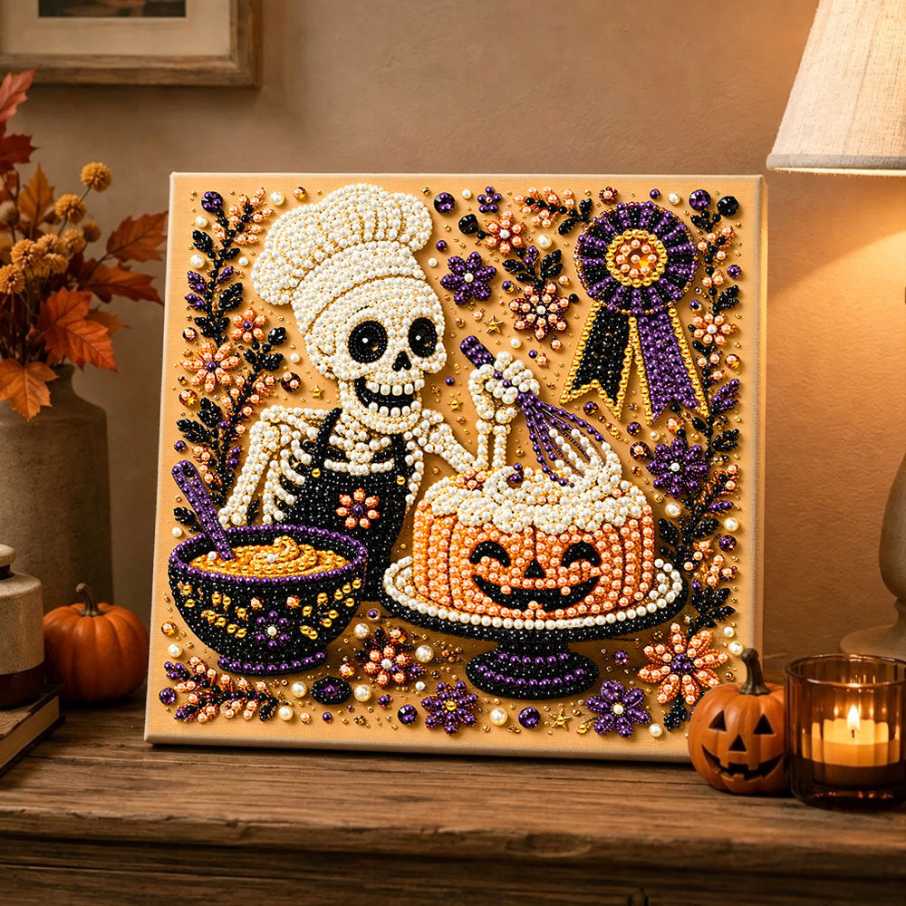 Finished skeleton chef and pumpkin cake pearl diamond painting artwork displayed as holiday home decor
