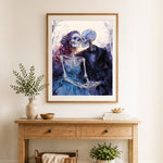 Finished skeleton couple kissing cross stitch artwork displayed as home decor