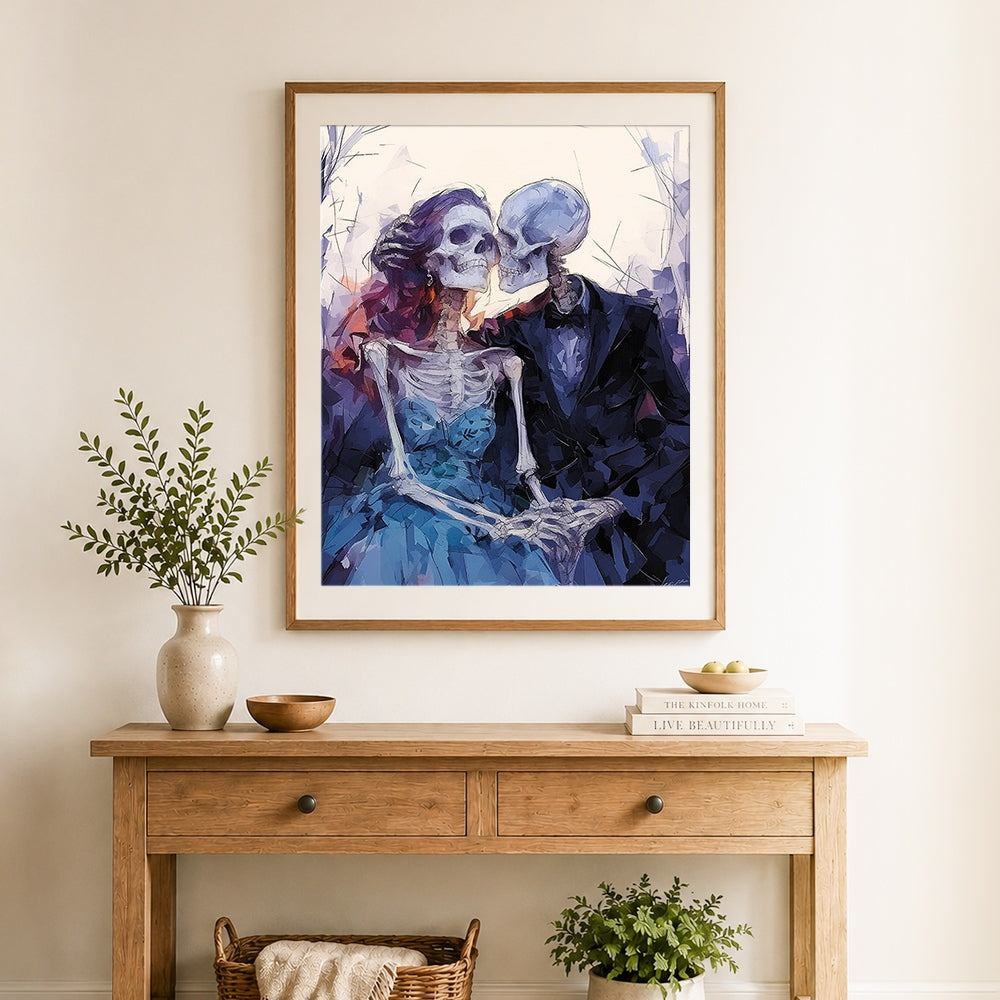 Finished skeleton couple kissing cross stitch artwork displayed as home decor