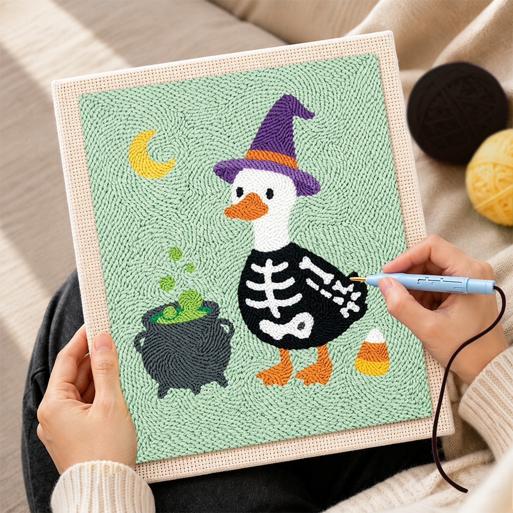 Creating handmade skeleton duck with witch hat punch needle artwork