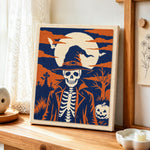 Skeleton gentleman in graveyard punch needle artwork displayed on a table
