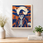 Finished skeleton gentleman in graveyard artwork displayed on a wall