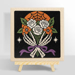 Skeleton hands holding roses punch needle kit for beginners