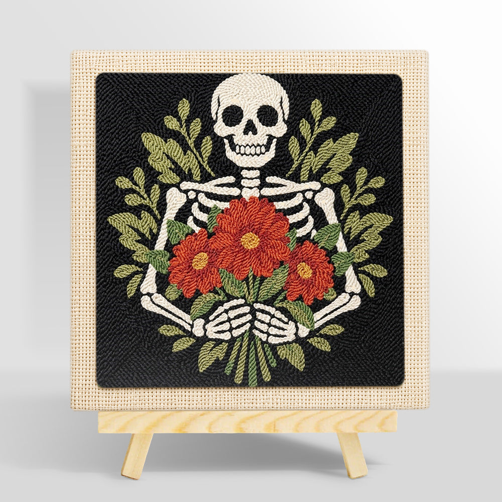 Skeleton holding red blooms punch needle kit for beginners