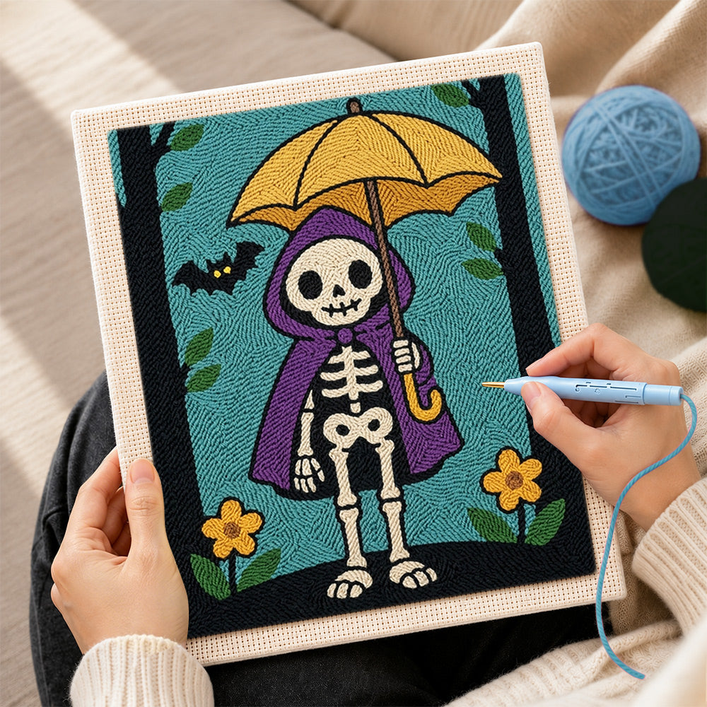 Creating handmade skeleton holding yellow umbrella punch needle artwork
