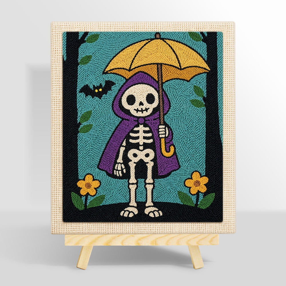 Skeleton holding yellow umbrella punch needle kit for beginners