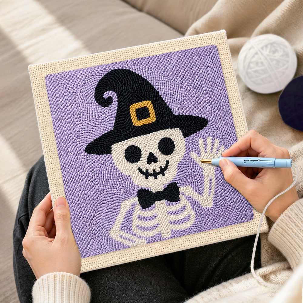 Creating handmade skeleton in witch hat punch needle artwork