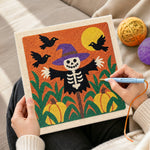 Creating handmade skeleton scarecrow in pumpkin field punch needle artwork