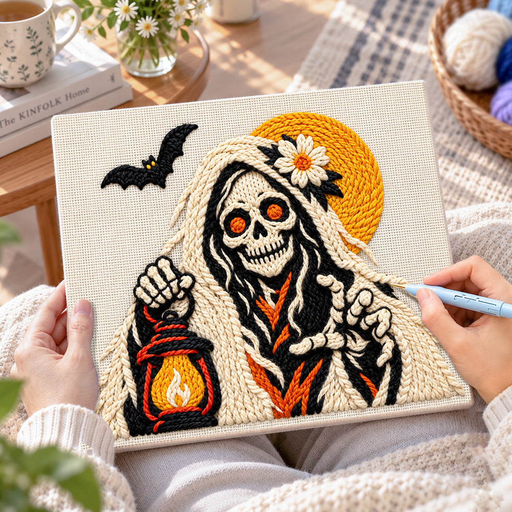 Creating handmade skeleton spirit holding lantern punch needle artwork