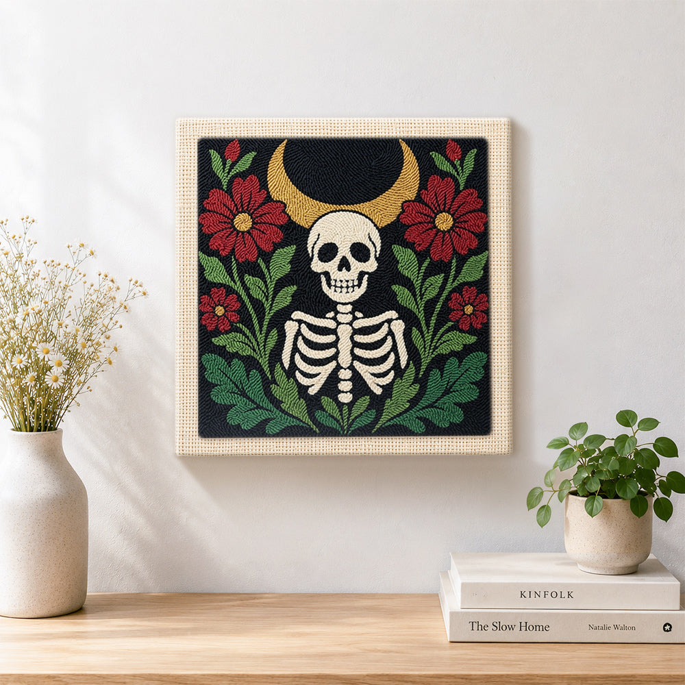 Finished skeleton surrounded by red blooms artwork displayed on a wall