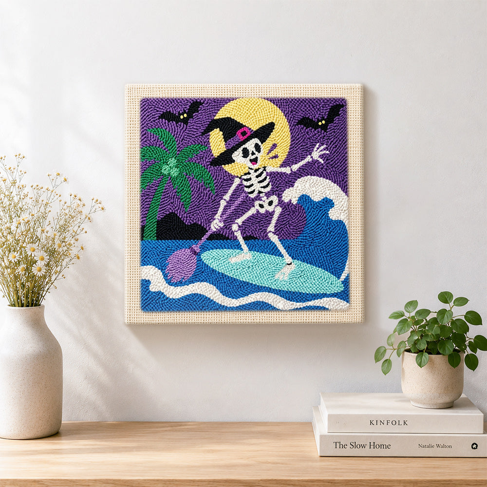 Finished skeleton witch paddle surfing artwork displayed on a wall
