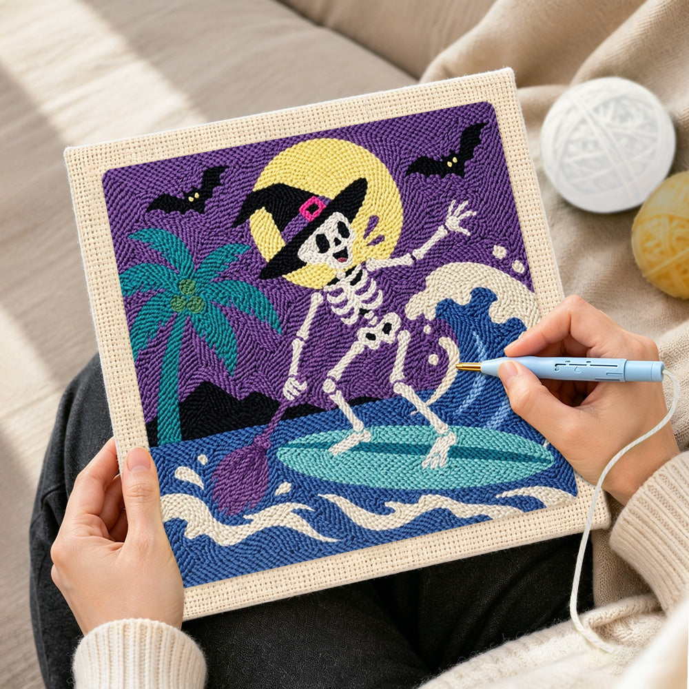 Creating handmade skeleton witch surfing waves punch needle artwork
