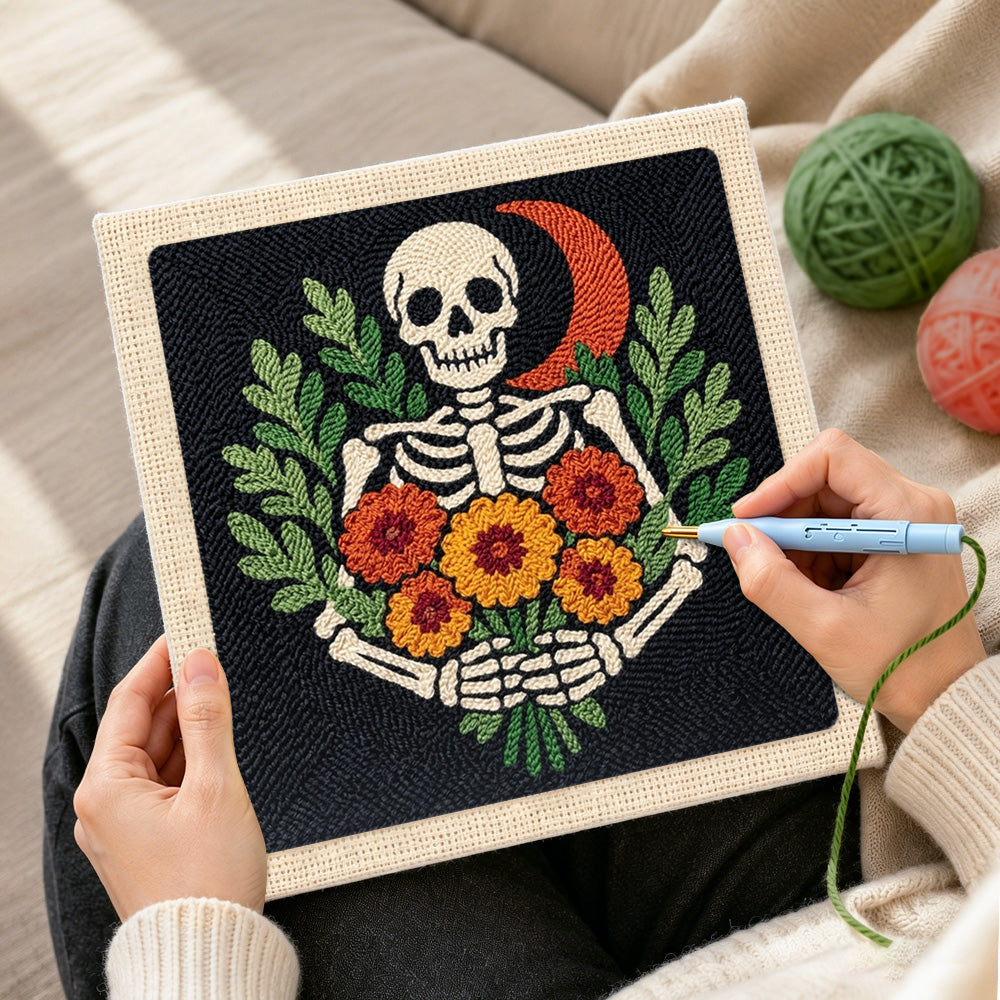 Creating handmade skeleton with marigolds punch needle artwork