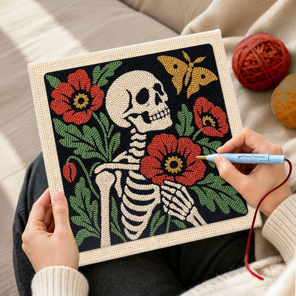 Creating handmade skeleton with poppies and butterfly punch needle artwork