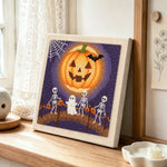 Skeletons trick or treat parade punch needle artwork displayed on a table