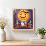 Finished skeletons trick or treat parade artwork displayed on a wall