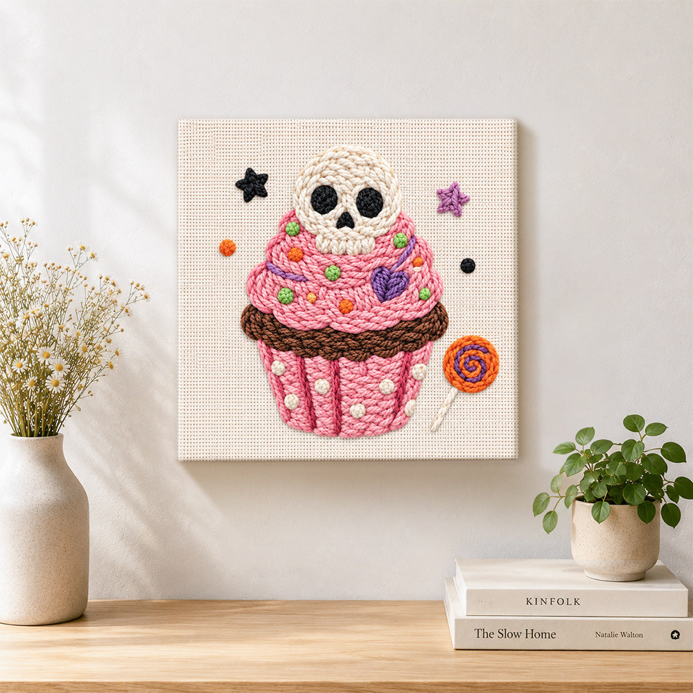 Finished skull cupcake treat artwork displayed on a wall 