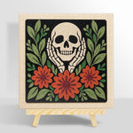 Skull cupping cheeks with autumn blooms punch needle kit for beginners