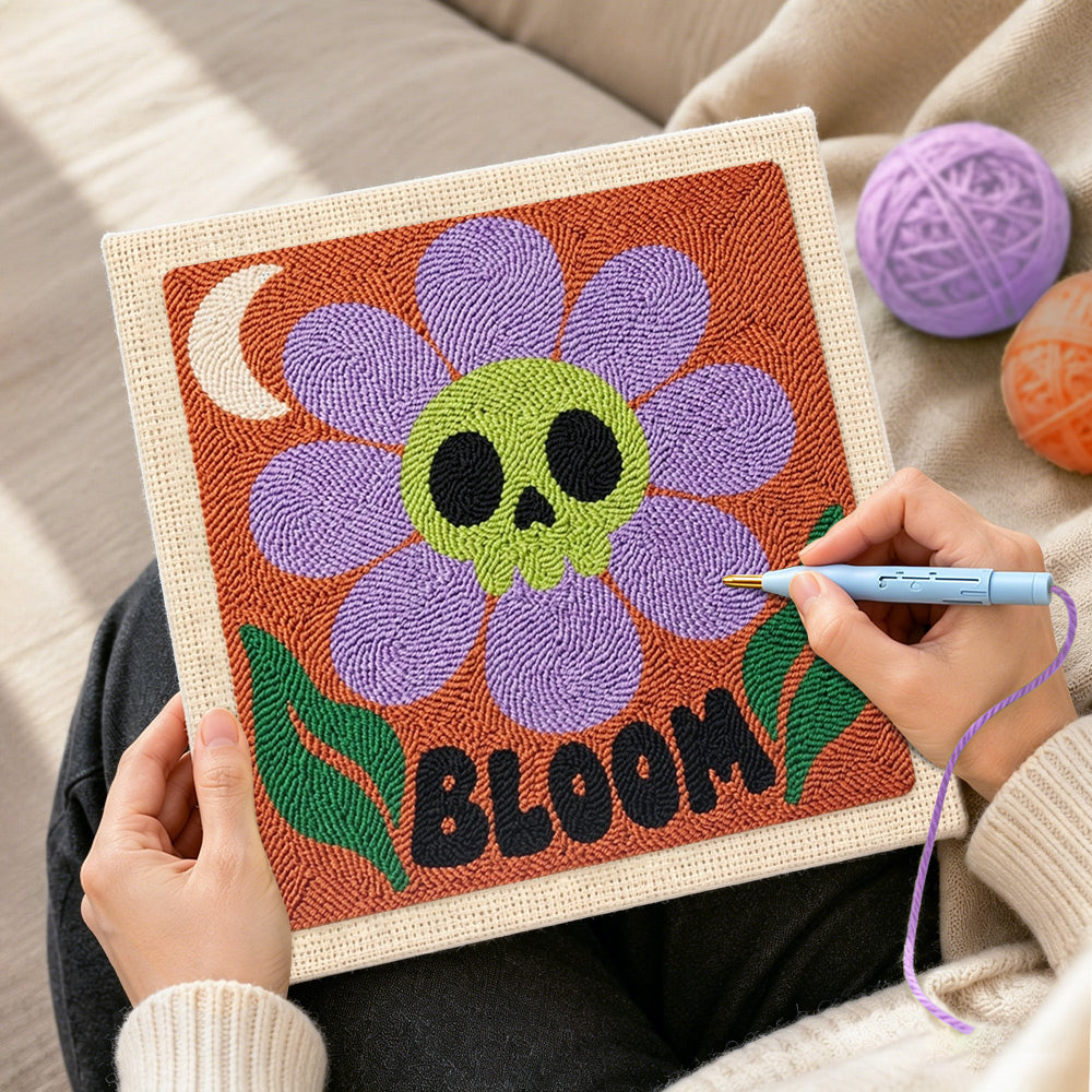 Creating handmade skull flower bloom punch needle artwork