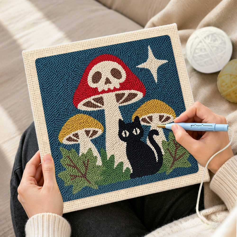 Creating handmade skull mushroom and black cat punch needle artwork