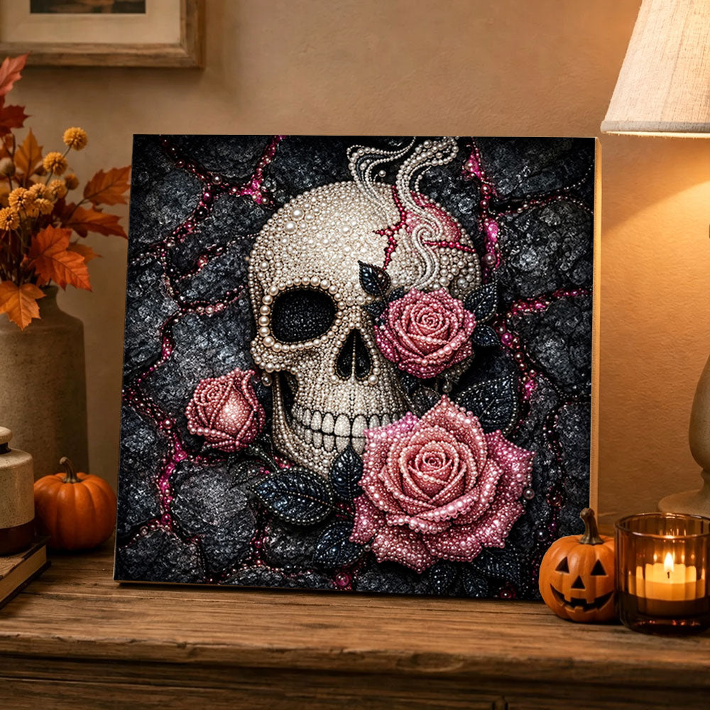 Finished skull with pink roses pearl diamond painting artwork displayed as holiday home decor