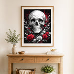 Finished skull with red roses cross stitch artwork displayed as home decor