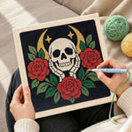 Creating handmade skull with red roses punch needle artwork