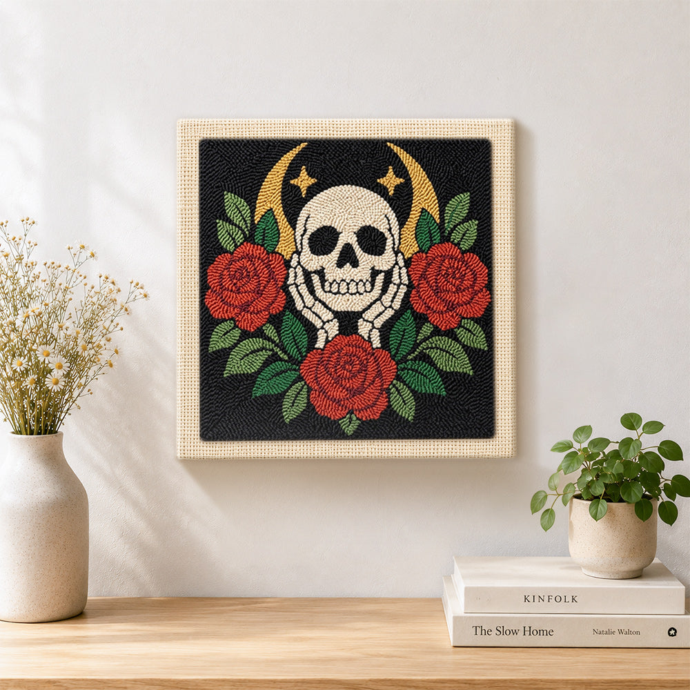 Finished skull with red roses artwork displayed on a wall