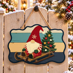 Sledding gnome joy paint by numbers door hanger on a garden gate