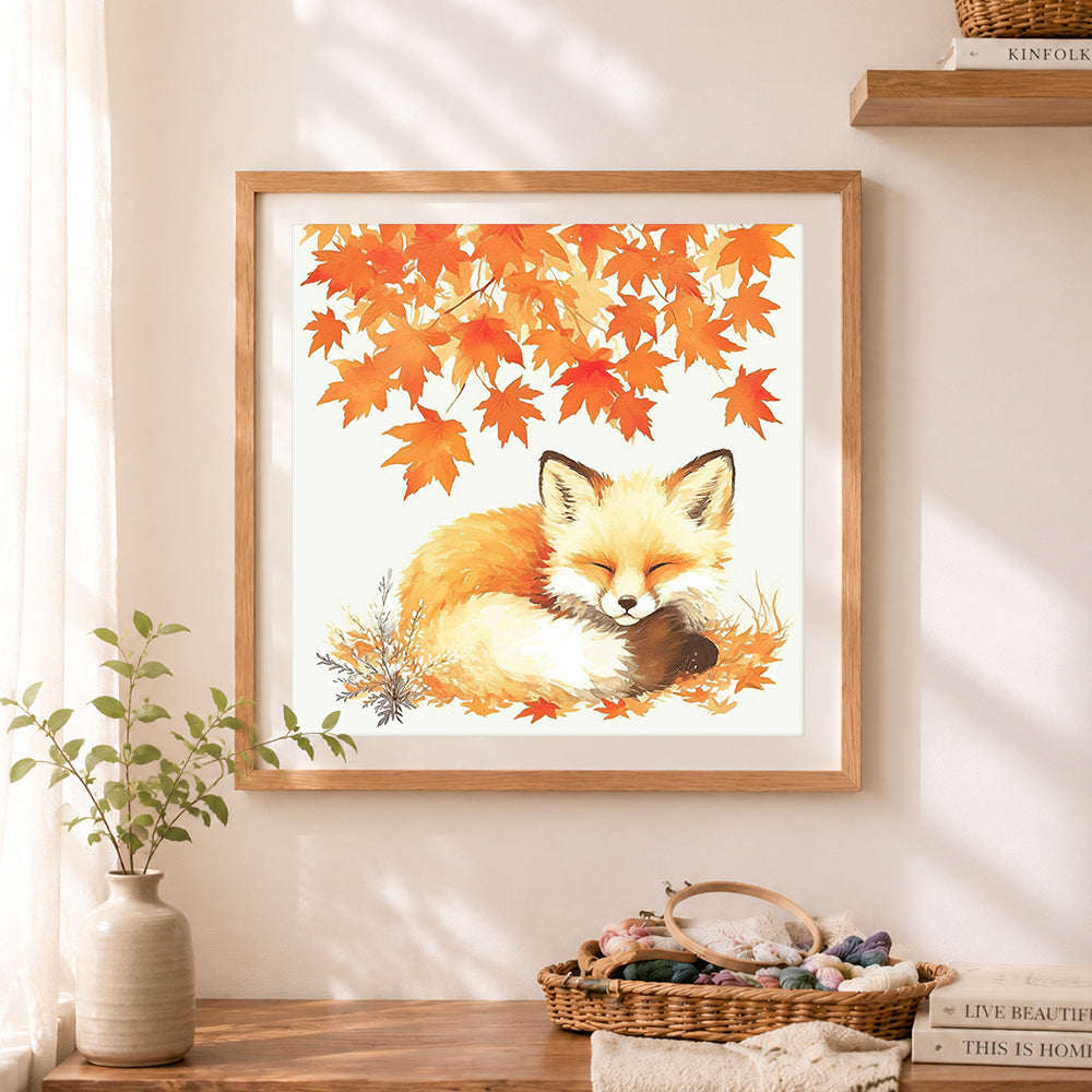 Finished sleeping autumn fox cross stitch artwork displayed as home decor