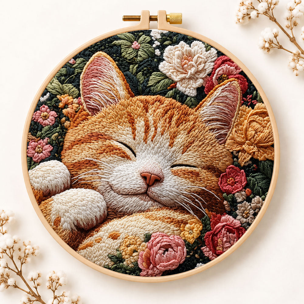 Sleeping ginger cat among roses embroidery kit
