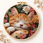 Sleeping ginger cat among roses embroidery kit