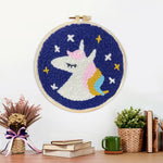 Finished sleeping unicorn under stars artwork displayed on a wall