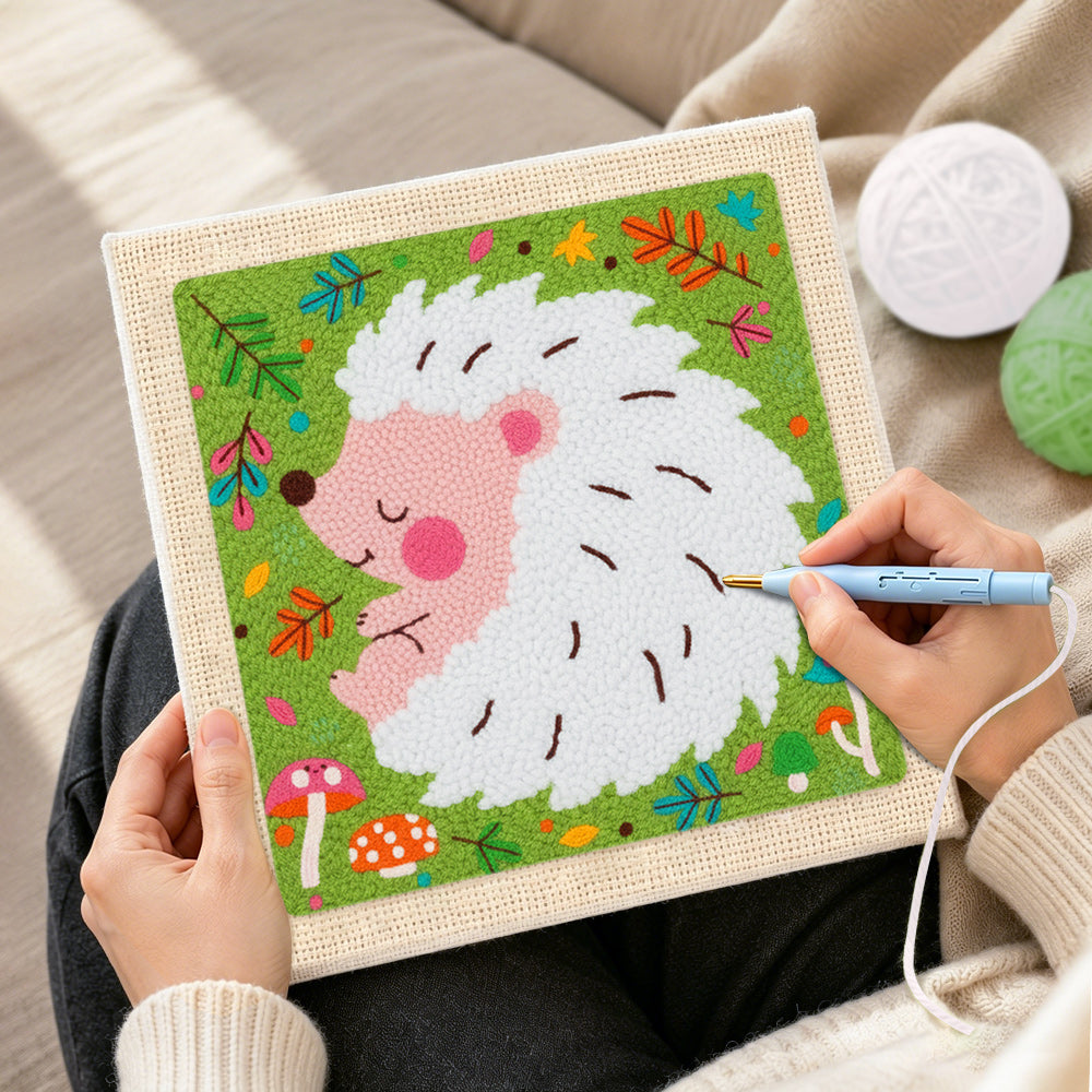 Creating handmade sleeping white hedgehog punch needle artwork