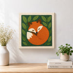 Finished sleeping woodland fox artwork displayed on a wall