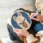 Creating handmade sleepy alpaca punch needle artwork