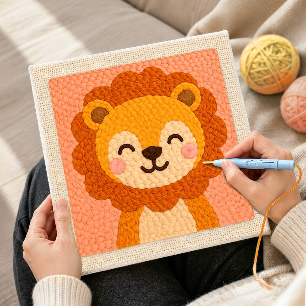 Creating handmade smiling baby lion punch needle artwork