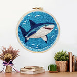 Finished smiling deep-sea shark artwork displayed on a wall