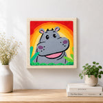 Finished smiling gray hippo with rainbow sunset artwork displayed on a wall